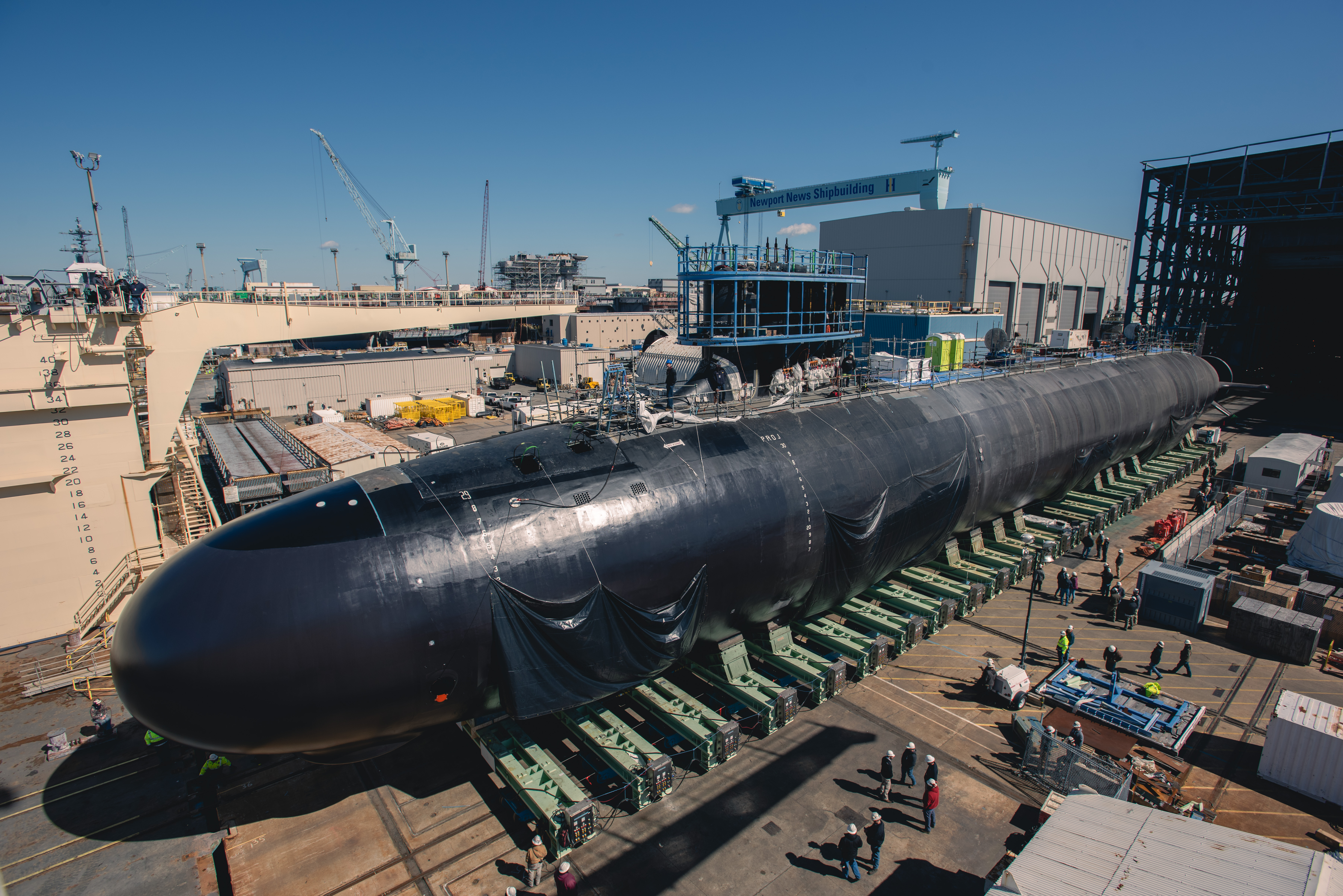 Virginia-class submarine New Jersey (SSN 796) was recently launched into the James River at HII’s Newport News Shipbuilding division.The 7,800-ton submarine, which had been in a floating dry dock since being transferred from a construction facility in March, was submerged and moved by tugboats to the shipyard’s submarine pier for final outfitting, testing and crew certification.